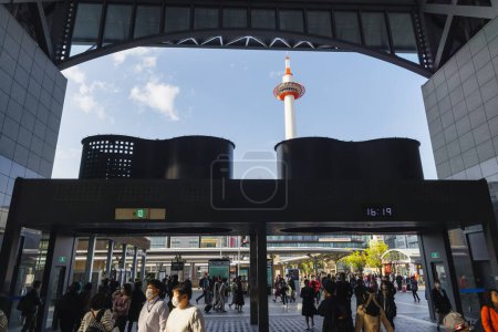 Photo for Kyoto, Japan - April 17, 2023: view from entrance of the Kyoto station to the Kyoto Tower, with unidentified people. Kyoto is the ninth most populous city in Japan - Royalty Free Image