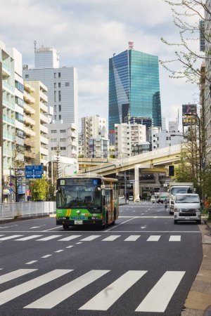 Photo for Tokyo, Japan - April 08, 2023: street view of the Azabu-Dori Avenue in Tokyo. The street is located in the Azabu-Juban district, a residential area in central Tokyo - Royalty Free Image