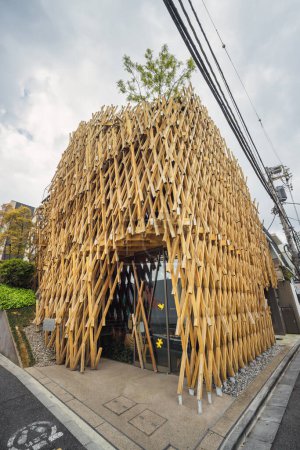 Photo for Tokyo, Japan - April 08, 2023: Sunny Hills at Minami - Aoyama is a pineapple cake shop, located inside towering three-dimensional timber lattice, a work of architect Kengo Kuma and, completed in 2013 - Royalty Free Image