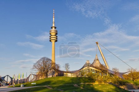 Photo for Munich, Germany - April 05, 2023: Olympiahalle with Olympic Tower in the Olympic Park in Munich. It is a multi-purpose arena. The Olympic Park was constructed for the 1972 Summer Olympics - Royalty Free Image