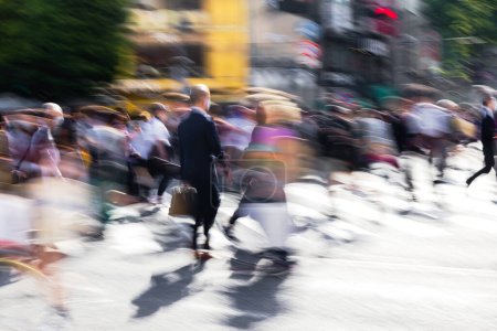 Photo for Abstract photo of a crowd of people crossing a street in the big city - Royalty Free Image