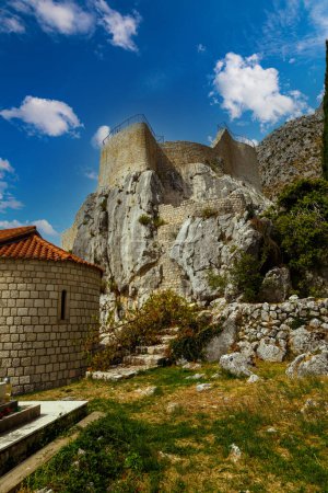 Photo for View on ancient Sokol Grad, Falcon Fortress, Sokol kula, outdoors, castle on the mountain. Defensive medieval castle in Konavle town near Dubrovnik city. Croatia. Tourism destination - Royalty Free Image
