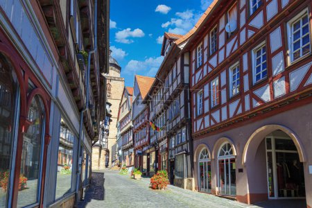 Photo for Alsfeld town. Hesse. Germany.  Ancient historical city, known for its half-timbered houses. Old town, narrow medieval street, colorful facades of houses.   Famous tourist destination . - Royalty Free Image