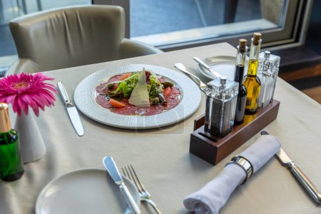 Photo for Beef carpaccio served in the restaurant - Royalty Free Image