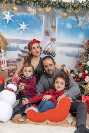 Photo for Happy family with kids celebrating Christmas - Royalty Free Image