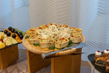 Photo for Food served on a banquet table in a meeting room - Royalty Free Image