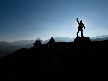 Téléchargez les photos : The man with adventure on his compass and boldly advancing to the goal - en image libre de droit