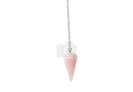 Pink color rose quartz crystal pendulum on chain isolated on white background. Lot of copy space.