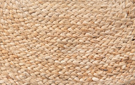Photo for Flat lay view of natural color braided jute (Corchorus olitorius and Corchorus capsularis)material table place mat. Background texture concept. - Royalty Free Image