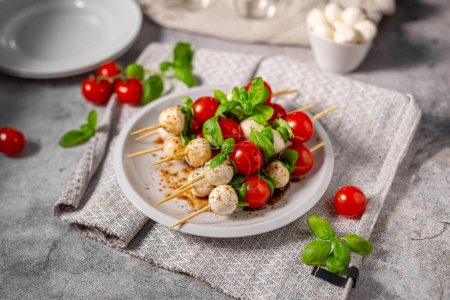 Photo for Simple and beautiful food with basil, mozzarella and balsamico - Royalty Free Image