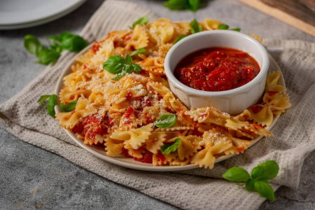 Photo for Delicious and simple pasta with marinara sauce, full of garlic and spice - Royalty Free Image
