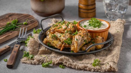 Photo for Delicious chicken wings with parmesan mayo and garlic dipping - Royalty Free Image