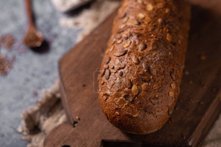Photo for Delicious wholegrain bread with seeds and organic flour - Royalty Free Image