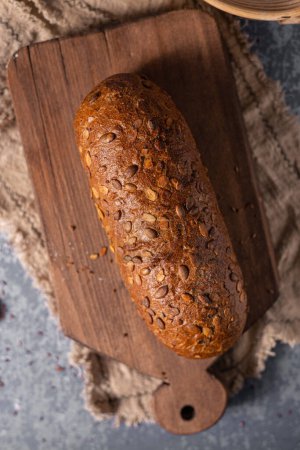 Photo for Delicious wholegrain bread with seeds and organic flour - Royalty Free Image
