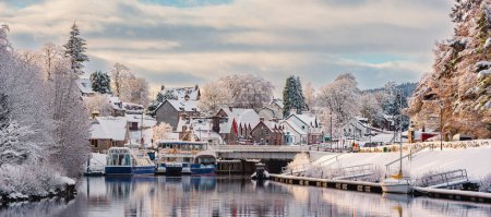 Photo for A panoramic view of snow-covered Fort Augustus, a village on the banks of Loch Ness in the Scottish highlands - Royalty Free Image