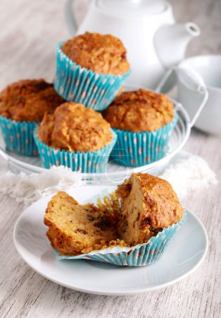 Photo for Carrot fruit and nut muffins, homemade healthy cakes - Royalty Free Image
