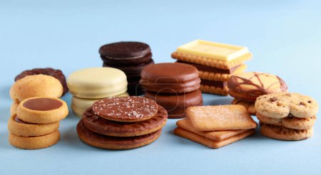 Photo for Assorted cookies on blue background - Royalty Free Image