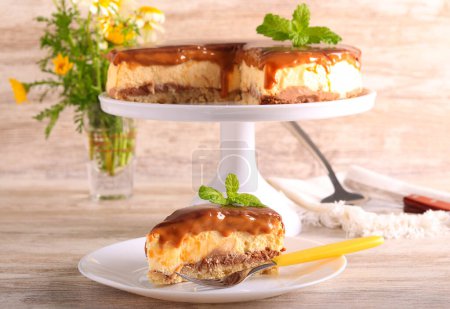 Photo for Chocolate, nut and caramel cheesecake - Royalty Free Image