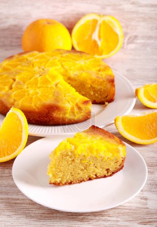Orange upside down cake, sliced and served