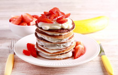 Photo for Banana pancakes with skyr and strawberry - Royalty Free Image