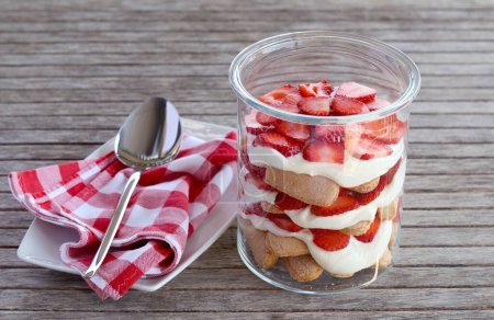 Photo for Strawberry and cream dessert trifle in a jar - Royalty Free Image