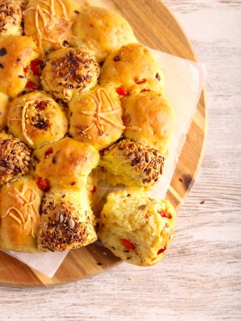 Photo for Mixed bread rolls with cheese, seeds and pepper - Royalty Free Image