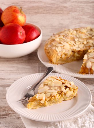 Photo for Fresh apple tart with almond topping - Royalty Free Image