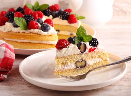 Photo for Cream and mixed berry sandwich cake, served - Royalty Free Image