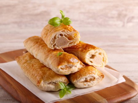 Photo for Sausage rolls on wooden board - Royalty Free Image