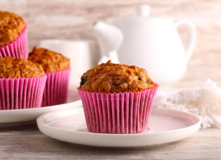 Photo for Carrot muffins with nuts and berries - Royalty Free Image