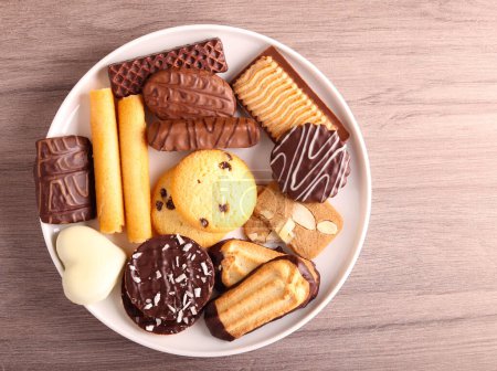 Photo for Mix of different cookies on plate - Royalty Free Image