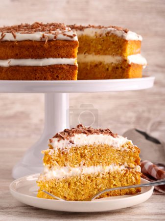 Photo for Homemade carrot sandwich cake, on stand plate - Royalty Free Image