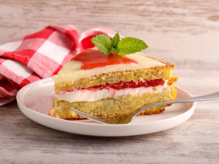 Photo for Slice of zucchini and strawberry cake on plate - Royalty Free Image
