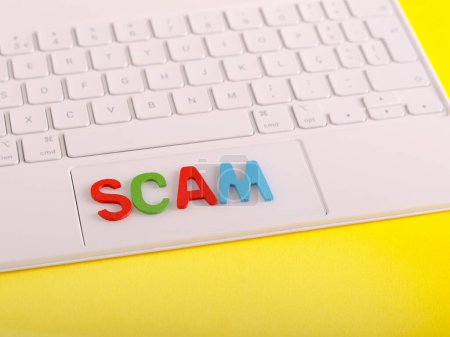 Photo for The word  scam over keyboard. The fraud concept - Royalty Free Image
