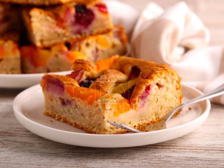 Photo for Whole grain mixed fruit and berry cake slices. - Royalty Free Image