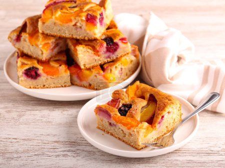 Photo for Whole grain mixed fruit and berry cake slices. - Royalty Free Image
