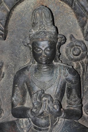 ancient indian artwork, sculpture and rock relief inside a old temple, place of worship