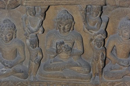 ancient indian artwork, sculpture and rock relief inside a old temple, place of worship