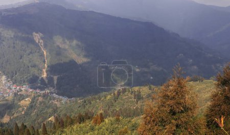 panoramic view lush green himalaya mountains foothills from simana basti view point, at the international border of india and nepal, darjeeling, india