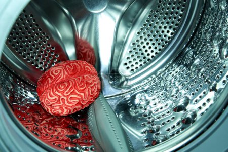 Photo for Red Rubber Human Brain Inside a Washing Machine, Brainwashing Concept. - Royalty Free Image