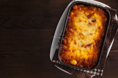 Téléchargez les photos : Gnocchi cuit au four avec sauce tomate et parmesan. - en image libre de droit