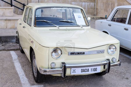 Foto de Bucharest, Romania, 2 October 2021: Old dark vivid blue Romanian Dacia 1100 classic car produced in year 1969, parked in a street at an event for vintage cars collections, in a sunny summer day - Imagen libre de derechos