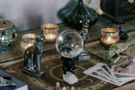 Esoteric Tarot and Crystal Ball Setup with Mystical Decor