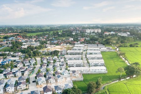 Photo for Land and housing estate in aerial view. May call residential building, village, community. Real estate or property from subdivision, construction, development for sale, buy and mortgage in Chiang Mai. - Royalty Free Image