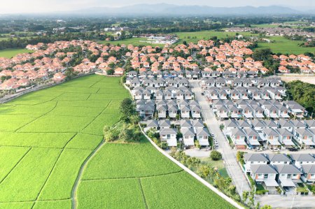 Téléchargez les photos : Land and housing estate in aerial view. May call residential building, village, community. Real estate or property from subdivision, construction, development for sale, buy and mortgage in Chiang Mai. - en image libre de droit