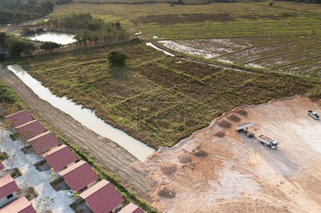 Téléchargez les photos : Land, field and soil backfill in aerial view. Include landscape, home house building, empty or vacant area. Real estate or property for development, construction, sale, buy in Chiang Mai of Thailand. - en image libre de droit