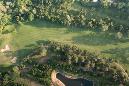 Photo for Golf course, landscape or green field in aerial view. Include lawn, grass, slope and hole. Design for golfers to play game, sport, outdoor recreation activity. - Royalty Free Image