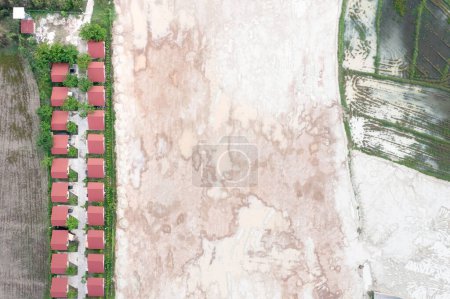 Téléchargez les photos : Land, field and soil backfill in aerial view. Include landscape, home house building, empty or vacant area. Real estate or property for development, construction, sale, buy in Chiang Mai of Thailand. - en image libre de droit