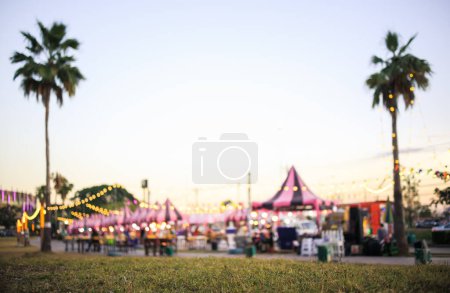 Photo for Blur image of flea market and food fair in Chiang mai city of Thailand. Also called festive food, street food. Marketplace consist of booth tent, shop, vendor and food stall. Busy with people. - Royalty Free Image