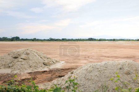 Land, landscape at evening. Include soil backfill, empty or vacant area at outdoor. Real estate or property for small plot, development, housing subdivision, construction and investment in Chiang Mai.